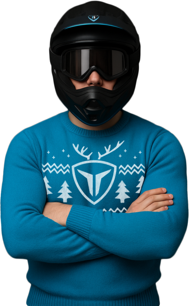 Free-rider au casque PROSPAD avec pull bleu noël en laine TROTRX pour la promo Black Friday et Black December 2025